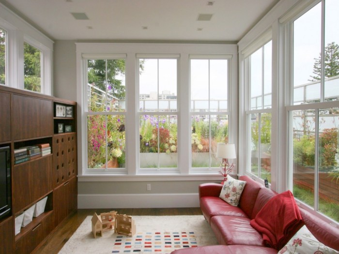 Room living large windows bright beautiful modern hung double